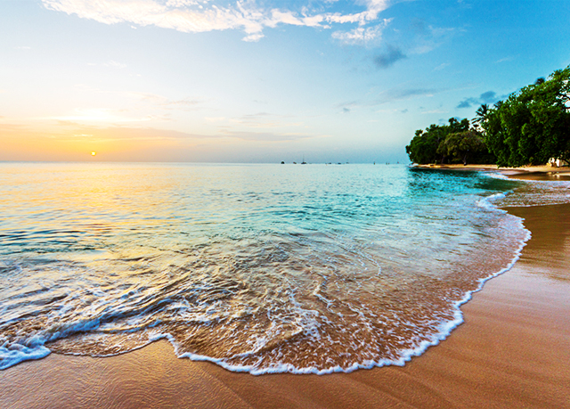 A gorgeous sunset on a Barbados beach.